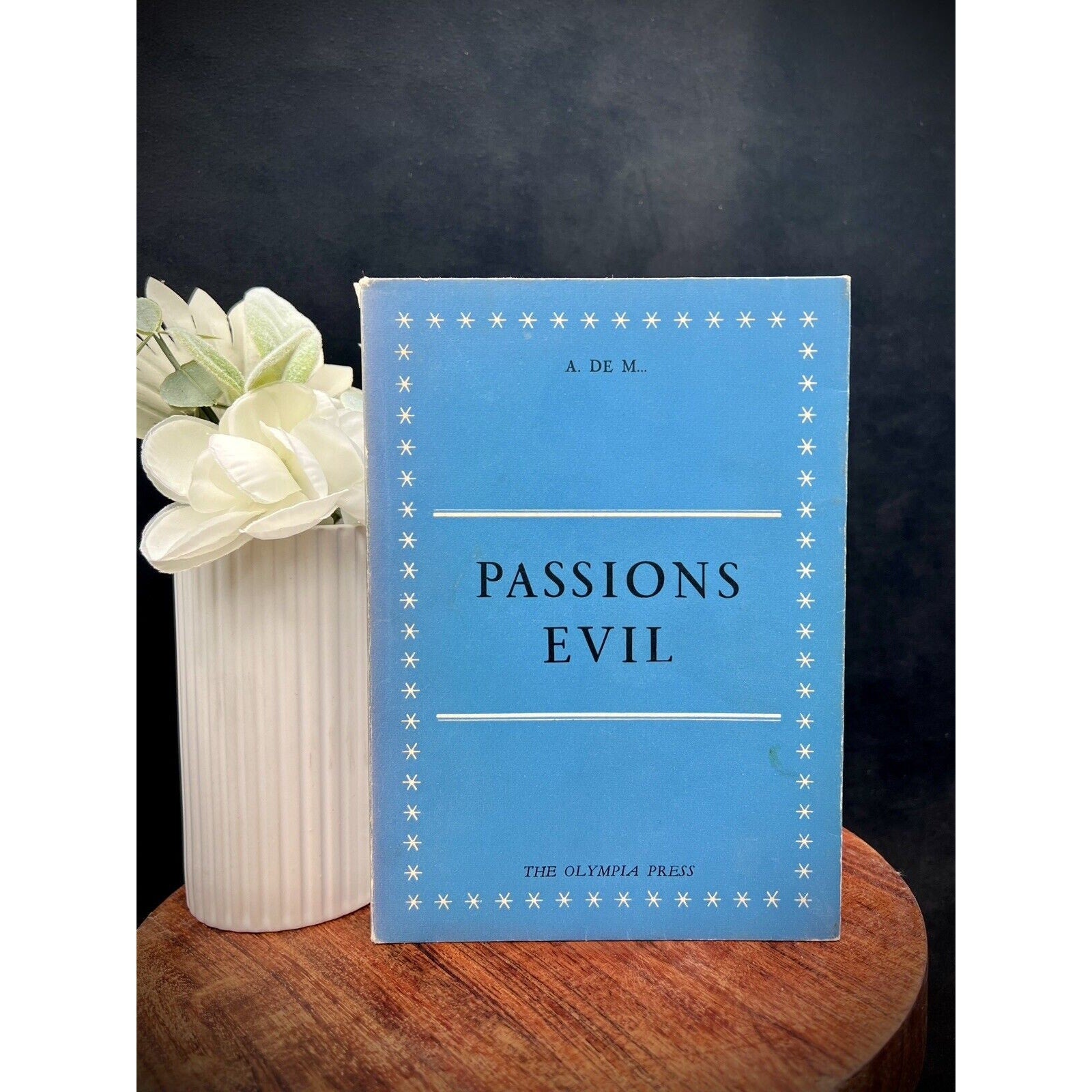 Passions Evil by Alfred de Musset, 1953 Olympia Press numbered first edition, blue cover with star border.