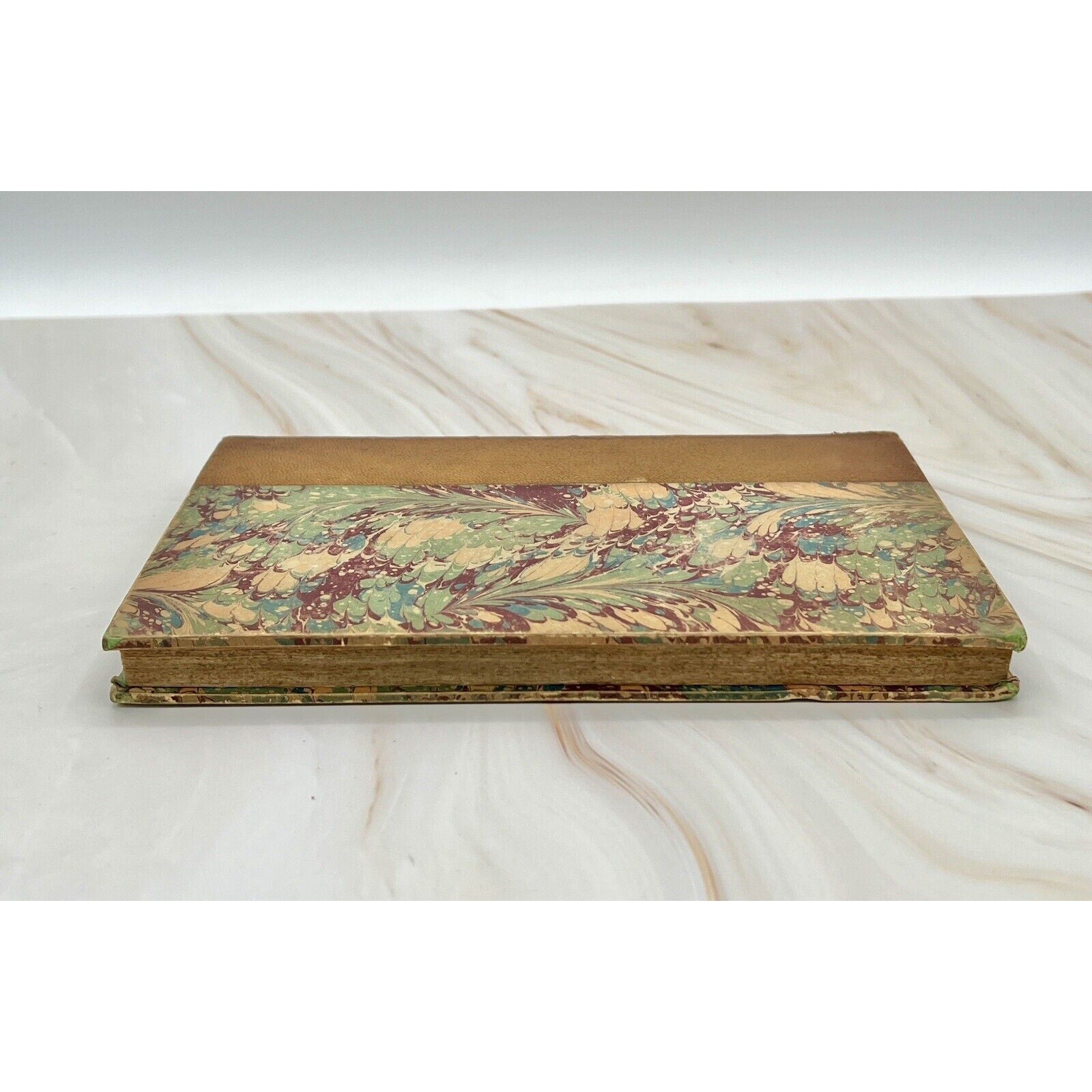 Errotika Biblion by Mirabeau, 1783 first edition, leather-bound with marbled cover.