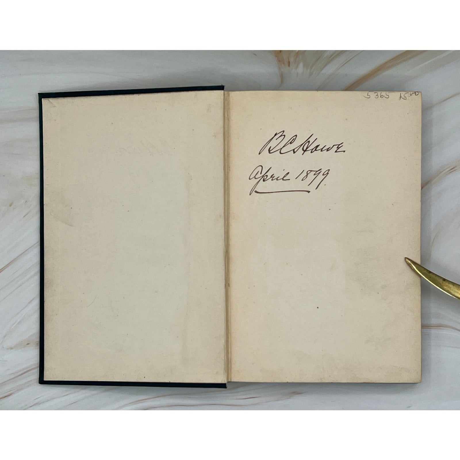 Open antique Kipling Soldier Stories (1897) hardcover; handwritten inscription on blank pages.